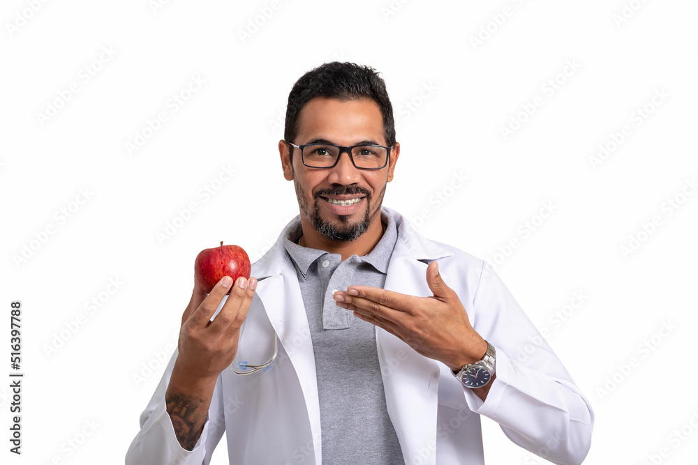 nutritionist doctor, the man holds up the apple and points, .smiling at the camera. healthy eating,.concept of correct nutrition isolated on white background nutritionist doctor, the man holds up the apple and points, .smiling at the camera. healthy eating,.concept of correct nutrition isolated on white background