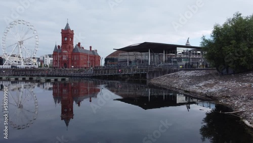 The Bay Area of Cardiff showing the Welsh Sennedd building and the old red stone Pierhead Building UK
 photo