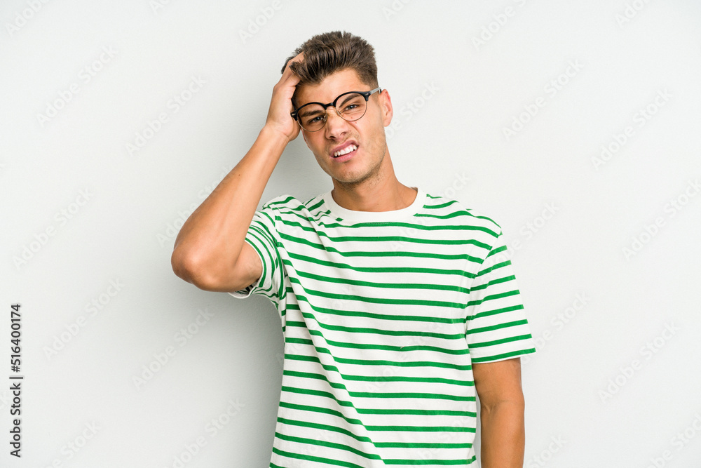 Young caucasian man isolated on white background tired and very sleepy keeping hand on head. Young caucasian man isolated on white background tired and very sleepy keeping hand on head.