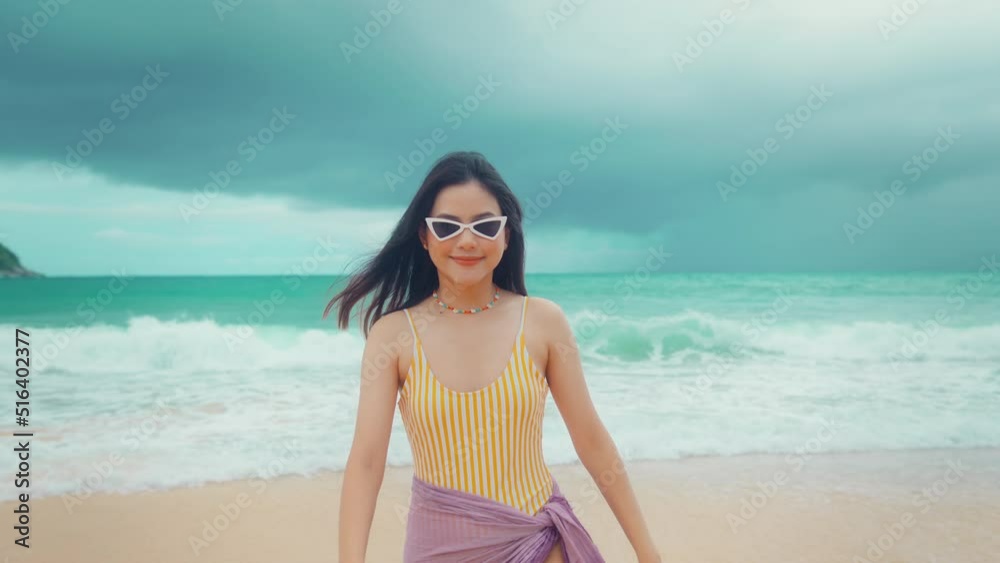 Young Beautiful woman in Bikini enjoying and relaxing on the beach, Summer, vacation, holidays, Lifestyles concept. Young Beautiful woman in Bikini enjoying and relaxing on the beach, Summer, vacation, holidays, Lifestyles concept.