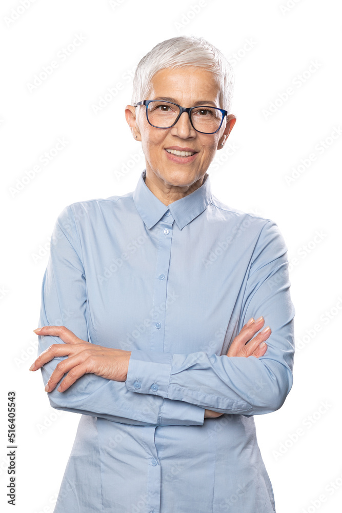 Senior expert businesswoman with glasses in a blue shirt and short white hair and glasses Senior expert businesswoman with glasses in a blue shirt and short white hair and glasses