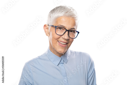 Senior Expert! Businesswoman with glasses in a blue shirt and short white hair and glasses © Adam Radosavljevic