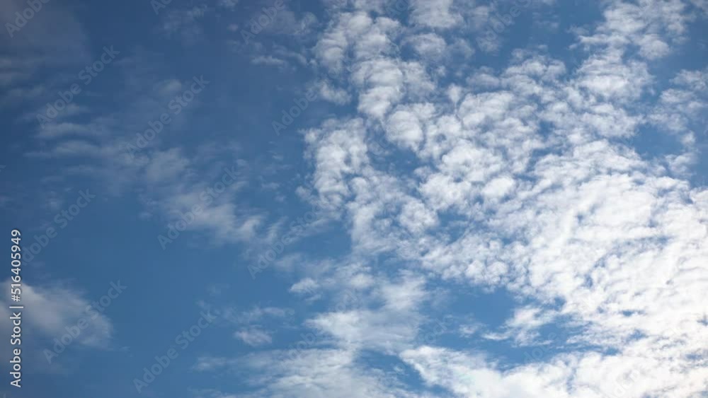 Beautiful cumulus clouds, illuminated by daytime sunlight, fly lightly and freely in the sky. The concept of freedom, lightness, light, Divinity. Accelerated 4K video. Beautiful cumulus clouds, illuminated by daytime sunlight, fly lightly and freely in the sky. The concept of freedom, lightness, light, Divinity. Accelerated 4K video.
