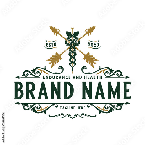 Vintage pharmacy logo. snake wrapped around aesculapius staff with two wings. for medical team, doctors, healing and treatment.