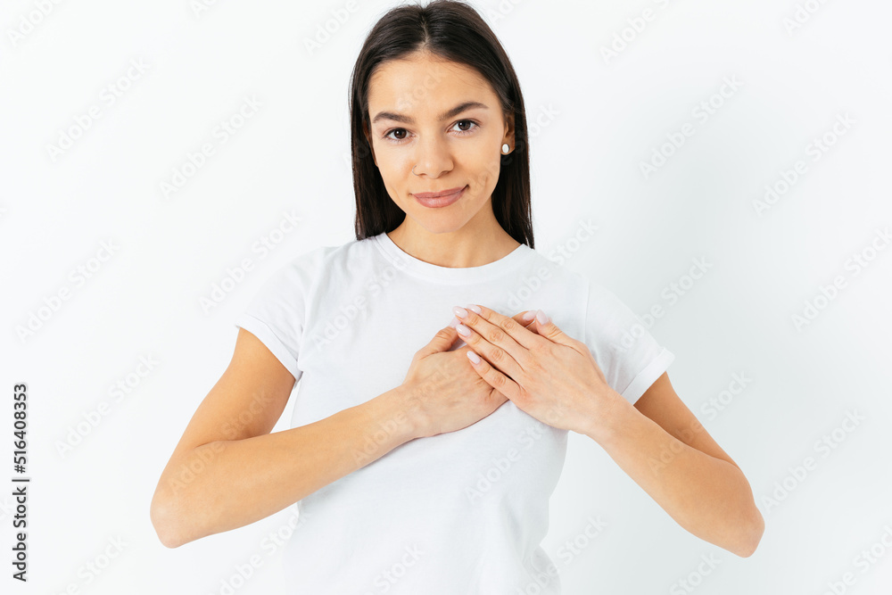 Friendly young woman with calm face and slight smile Friendly young woman with calm face and slight smile