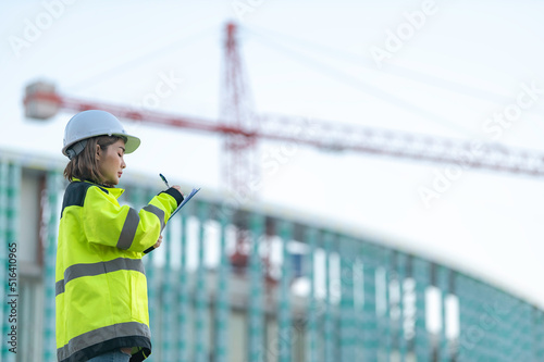 Asian engineer working at site of a large building project,Thailand people,Work overtime at construction site