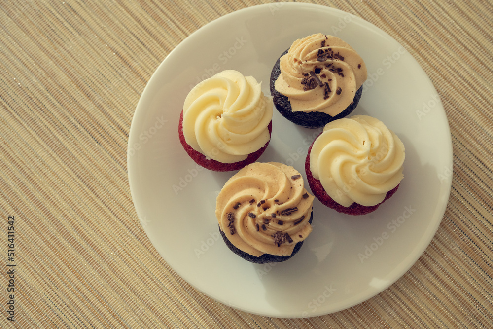 cupcakes with cream and chocolate cupcakes with cream and chocolate