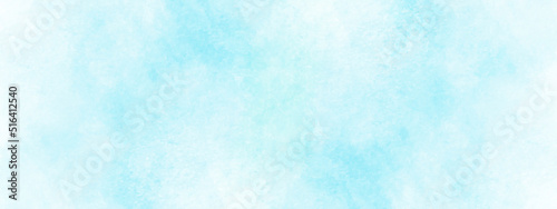 Creative soft light sky blue watercolor background with grainy white stains, Abstract blue watercolor background with grunge texture, Beautiful painted and scratched bright blue paper texture.