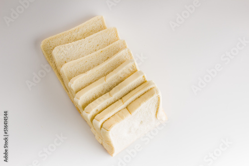 Loaf of sliced white bread isolated on white background