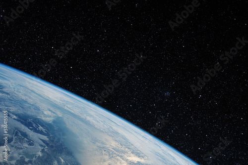 Fototapeta Naklejka Na Ścianę i Meble -  The earth from space in a star field. Elements of this image furnished by NASA.