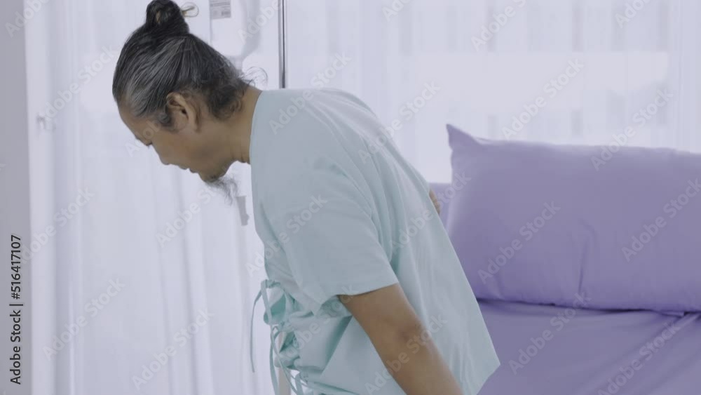Elderly patient in hospital bed. Asian depressed elderly male patients lying on bed in the hospital. Elderly patient in hospital bed. Asian depressed elderly male patients lying on bed in the hospital.