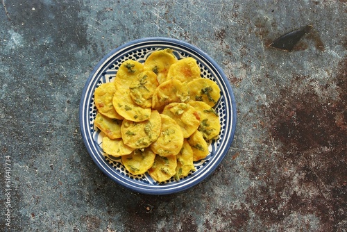 Potato Bhaja.Traditional African potato snack. Flat layot photo