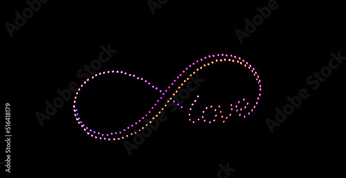 infinity symbol and the word love created by drones on the night sky