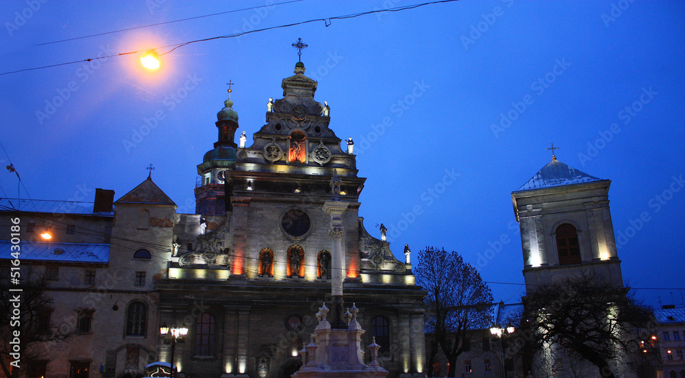 Catholic church and Bernardine monastery at nignt in Lviv, Ukraine