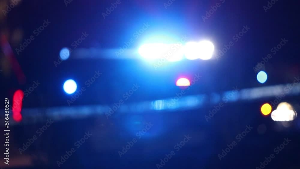 Police emergency lights at night blurred on car close up Police emergency lights at night blurred on car close up