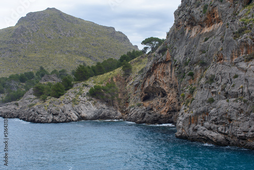 Turquoise sea water and coastal cliffs in Sa Calobra, Mallorca, Spain