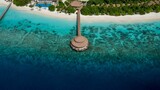 Aerial view of a resort hotel near the beach in the Maldives