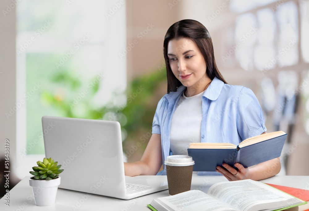 Business woman sit at table make correction in document, check data, student prepare essay, learn at home use tech concept Business woman sit at table make correction in document, check data, student prepare essay, learn at home use tech concept
