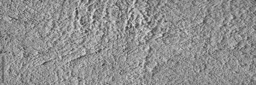Plaster texture. Stucco gray background. Panorama of a plastered wall. Dry textured cement. Plaster texture. Stucco gray background. Panorama of a plastered wall. Dry textured cement.