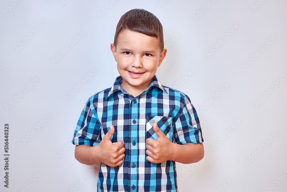 Handsome, smiling boy with thumbs up. Handsome, smiling boy with thumbs up.