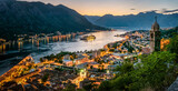 Panoramic evening view of the church, the old town and the Bay of Kotor from above. The Bay of Kotor is the beautiful place on the Adriatic Sea. Kotor, Montenegro.