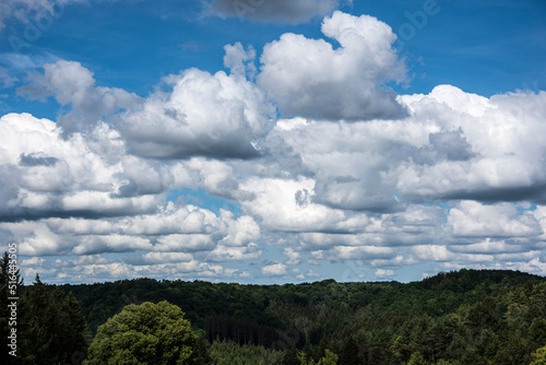 Obraz na płótnie clouds in blue sky on a sunny day w salonie