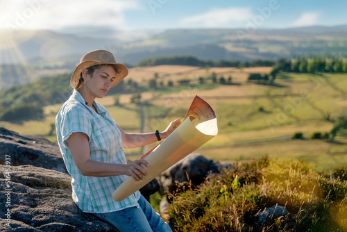 woman in hat looking at cart against fields Boosting your local tourism industry