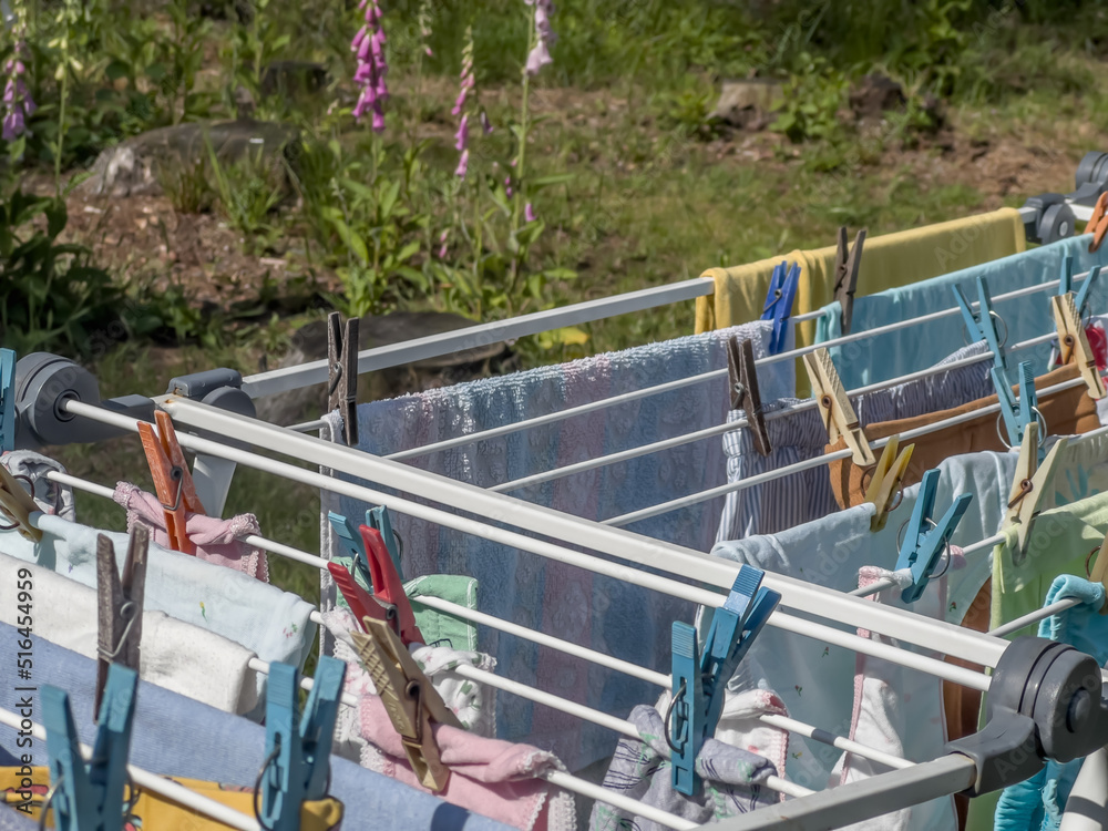 Drying of linen and other items of clothing after washing in a dryer placed in a forest clearing near the house