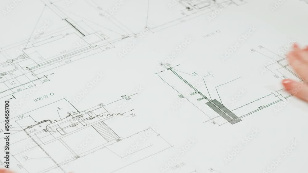 Architect designer drawing plan blueprint close-up. Professional engineer working, interior creator making architectural house project, drafting building. Architect designer drawing plan blueprint close-up. Professional engineer working, interior creator making architectural house project, drafting building.