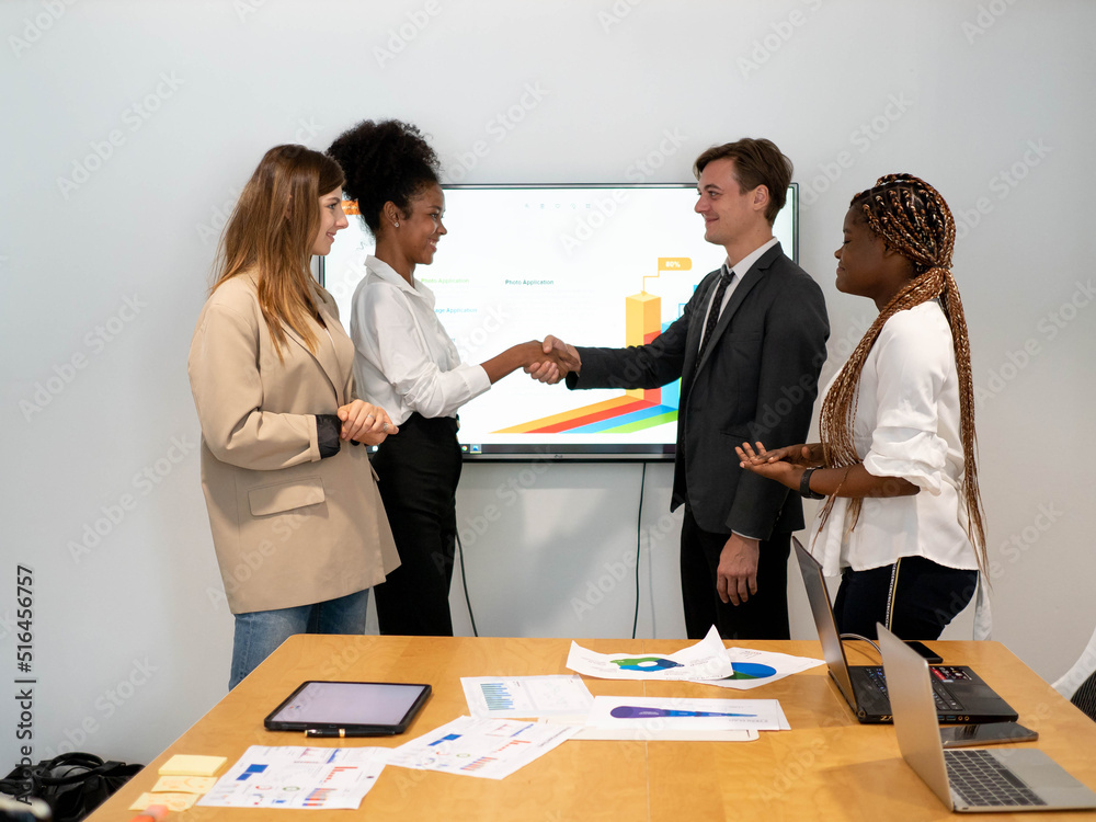 Fototapeta premium businesswoman businessman professional african diversity ethnic person hand check agreement contract business strategy colleague partner teamwork group meeting conference success indoor company office