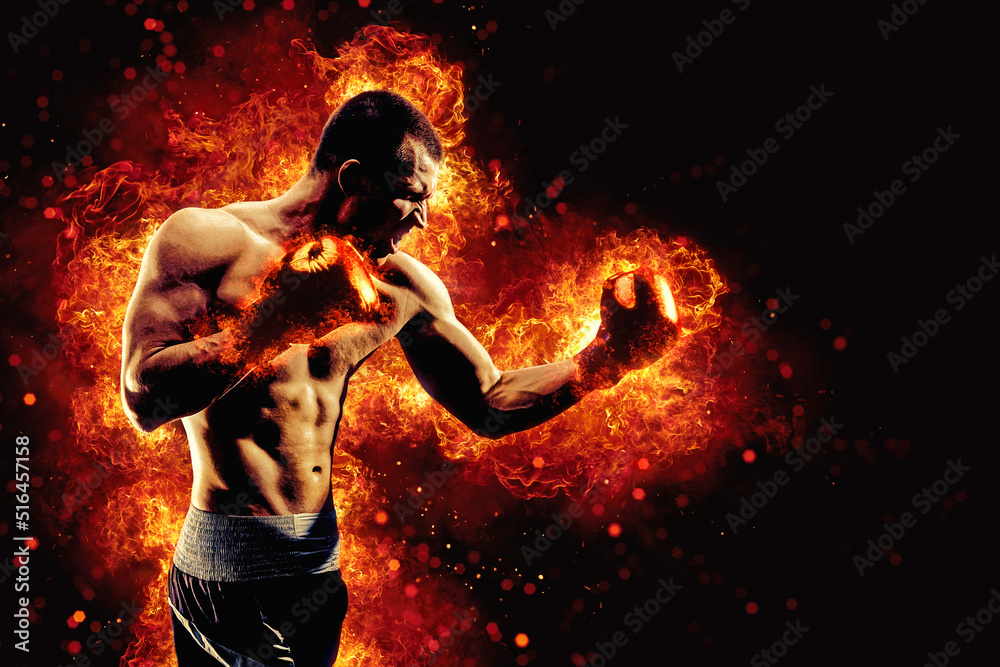 Fighter man in fire. Sport advertising. MMA boxer Fighter man in fire. Sport advertising. MMA boxer