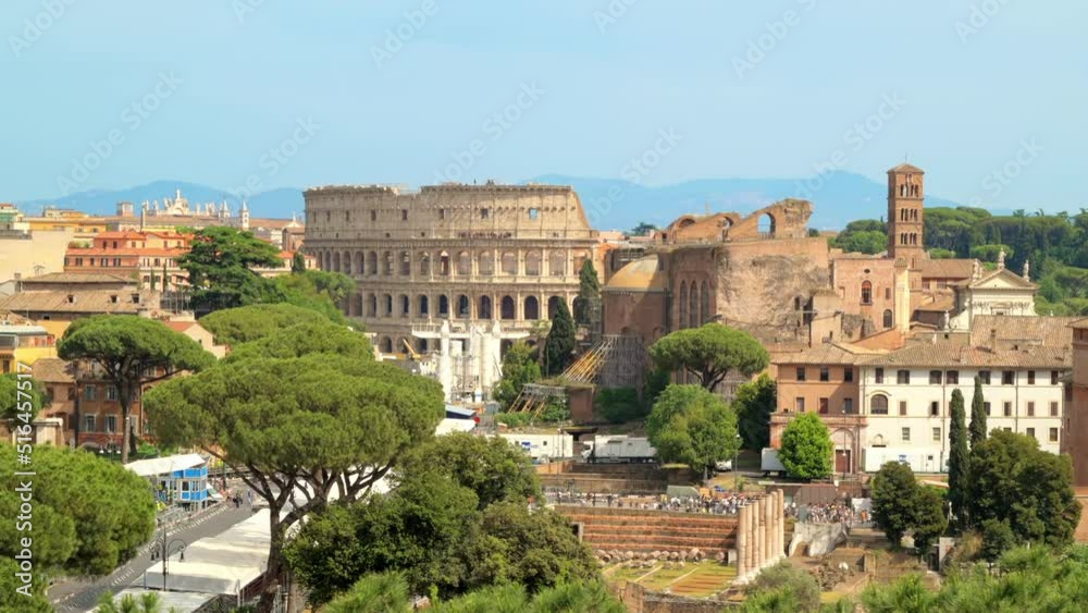 Timelapse cityscape of the Rome ancient centre, Italy. Multiple walking people, Colosseum and ancient excavations Timelapse cityscape of the Rome ancient centre, Italy. Multiple walking people, Colosseum and ancient excavations