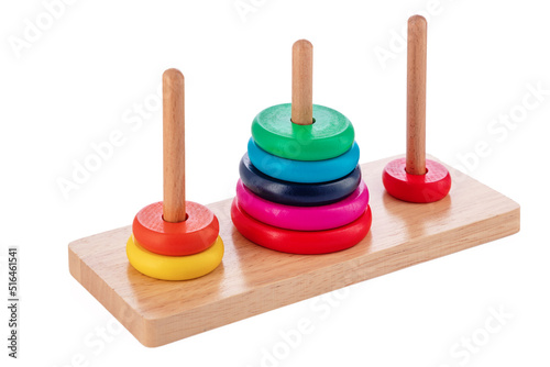 Wooden puzzle tower of hanoi with color rings isolated on white background. Toy for kids.