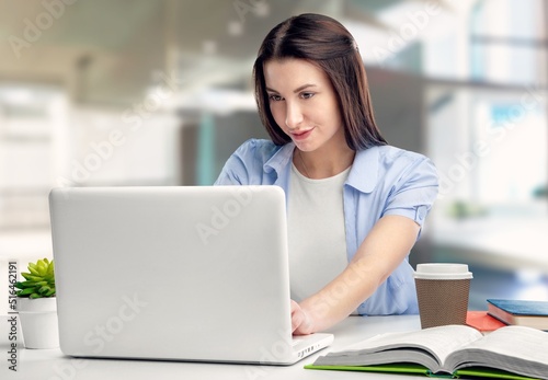 Businesswoman Using laptop computer and working at office, doing planning analyzing the financial report, business plan investment, finance analysis concept.