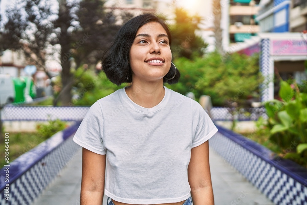 Young latin woman smiling confident standing at street Young latin woman smiling confident standing at street