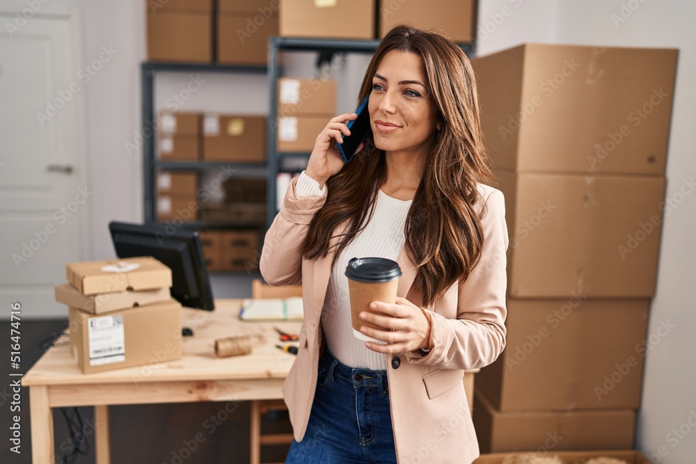Young hispanic woman ecommerce business worker talking on the smartphone at office Young hispanic woman ecommerce business worker talking on the smartphone at office
