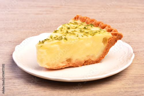 A slice of delicious lemon aloe vera pie served on table  