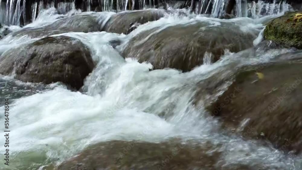 The stream flows through the rocks and rocks in the stream. The stream flows through the rocks and rocks in the stream.