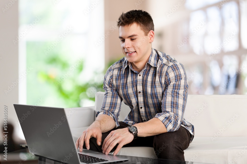 Young man work using computer hand typing laptop keyboard. student study learning education online Young man work using computer hand typing laptop keyboard. student study learning education online