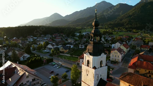 This is Preddvor in Slovenia. A small and idyllic town with breathtaking views and stunning panoramas. Nestled under the steep slopes of the perfect pyramid shaped Mount Storžič, it has 900 residents. photo