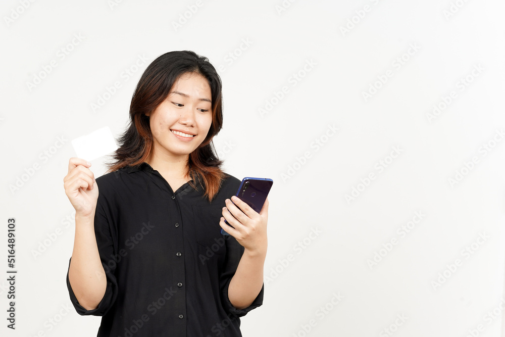 Holding smartphone and blank credit bank card of Beautiful Asian Woman Isolated On White Background Holding smartphone and blank credit bank card of Beautiful Asian Woman Isolated On White Background