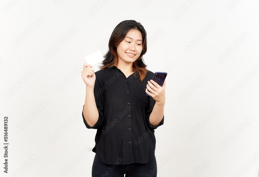 Holding smartphone and blank credit bank card of Beautiful Asian Woman Isolated On White Background Holding smartphone and blank credit bank card of Beautiful Asian Woman Isolated On White Background