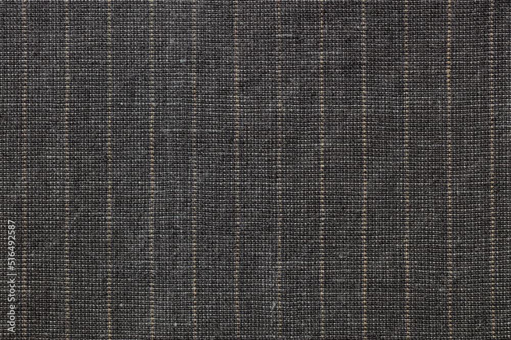 Fototapeta premium black cotton fabric with light yellow stripes. highly-textured pattern. macro view.