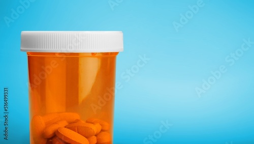 Medical vial with pills. Medical pills in orange Plastic Prescription