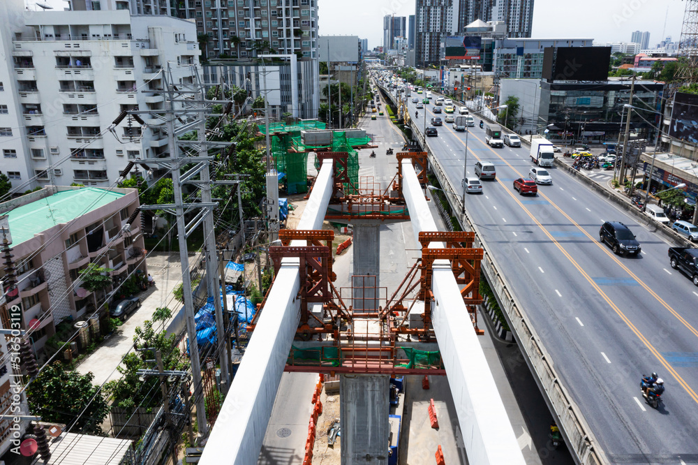 Bangkok urban Mass Transit Project (Pink Line Monorail). Aerial top view Construction of pink line monorail rail transit line in progress.Guide way beam, Light rail transit, construction machinery.