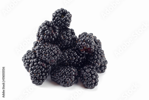 Tasty ripe blackberries on bright background. Close up view.