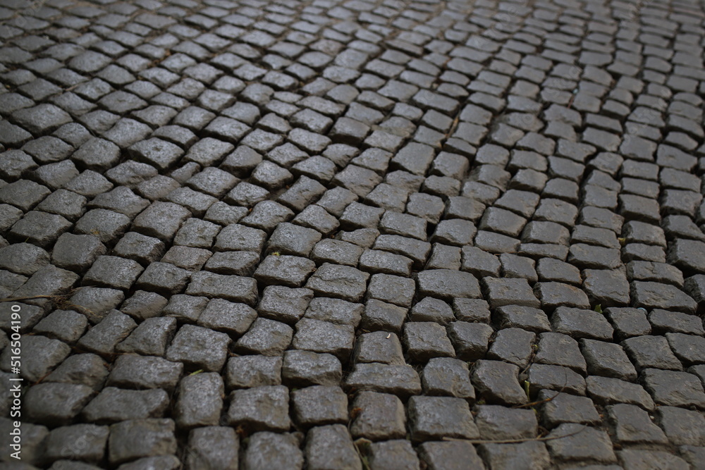 textured background of old cobblestone pavement textured background of old cobblestone pavement