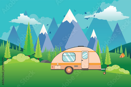 Mountains green hills and camping trailer