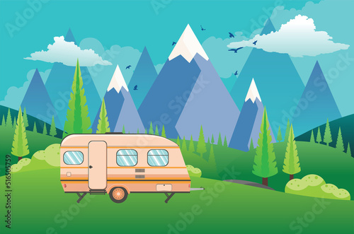 Mountains green hills and camping trailer