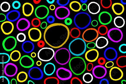 Beautiful pattern of irregular color circles on black background